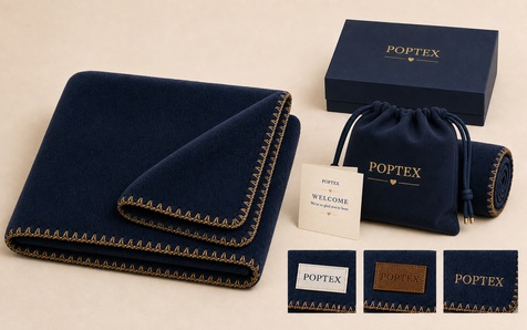 Premium navy blanket with custom branding and gift packaging